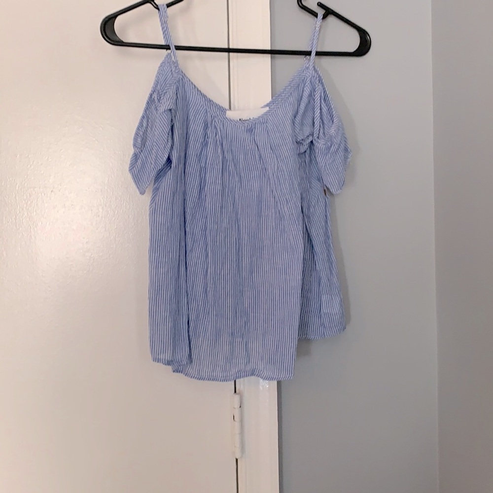 A blue over the shoulder top
